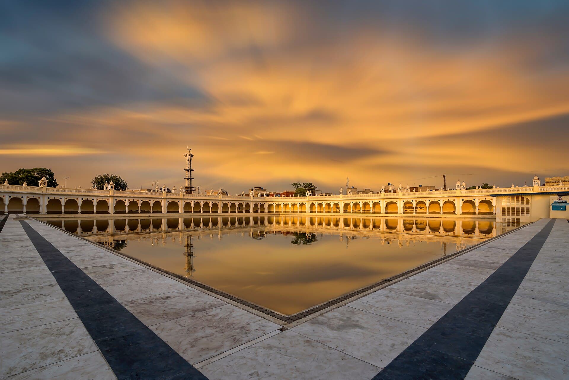 Evening falls over the sarovar of Gurdwara Janam Asthan, Nankana Sahib.